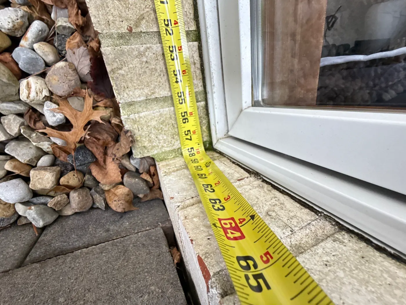Storm-damaged window documented in Summitville